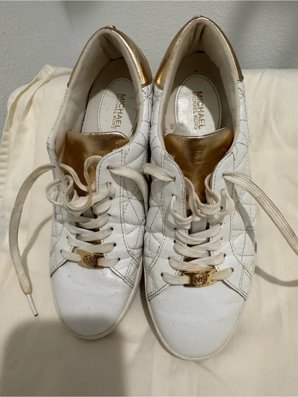 MICHAEL Michael Kors White Quilted Sneakers with Gold Accents